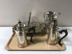 A tray of two plated coffee pots, plated embossed jug,