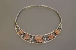 An impressive 18ct white and rose gold diamond set necklace,