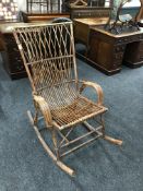 A vintage bamboo rocking chair