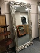 A large silvered mirror,