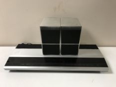 A Bang and Olufsen Beomaster 3000 together with a pair of Bang and Olufsen Beovox CX50 speakers