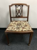 An inlaid mahogany dressing table chair