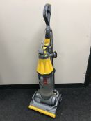 A Dyson DC07 upright vac