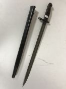 A Remington bayonet in scabbard dated 1913
