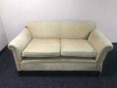 An early 20th century drop end settee