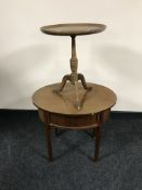 A circular mahogany occasional table and an oak wine table