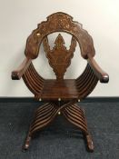 A brass inlaid Savonarola chair
