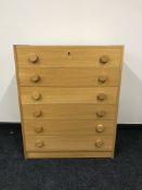 A 20th century oak four drawer chest
