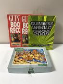 Two boxes of a quantity of Guinness Book of Records, coffee table volumes,