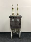 Four Dalex Quadamant beer pumps with porcelain handles depicting hunting scenes on stands