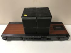 A Bang and Olufsen Beocenter 1600 together with a pair of Bang and Olufsen Beovox C40 speakers