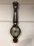 A Victorian inlaid mahogany barometer