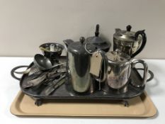 A plated twin-handled tray on paw feet and a quantity of plated wares including miscellaneous