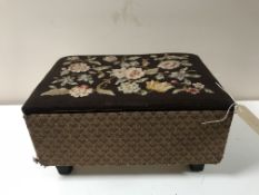 A tapestry sewing box containing vintage buttons