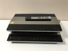 A Bang and Olufsen Beogram CD 4500 together with a Bang and Olufsen Beocord 4500 with remote