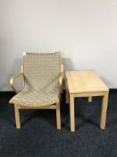 A beech framed armchair and a beech side table