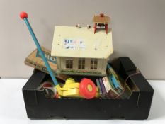 Two boxes of vintage children's toys - Fisher Price, Beano annuals etc.