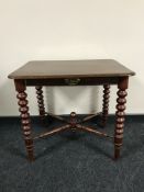 A stained pine side table fitted a drawer