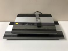 A Bang and Olufsen Beogram CD 3300 together with a Bang and Olufsen Beomaster 3300 with remote