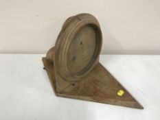 An antique pine wall bracket