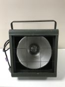 Four industrial lamps in cages with wall mounting brackets