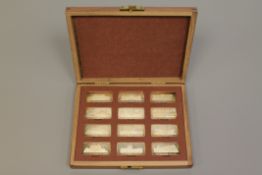 The Birmingham Mint, Royal Palaces, A collection of 12 sterling silver ingots,