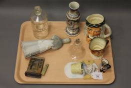 A tray of collectables including Chinese soapstone seal, Chinese carved diety, Spanish figure,