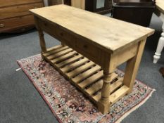 A pine double door pantry cupboard