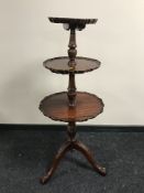 A Georgian style mahogany three tier dumb waiter