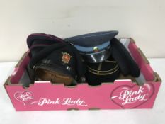 A box of six service caps including Queensland Fire Service, French Policeman's style hat,