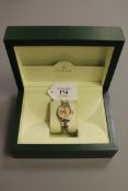 A lady's bi-metal Rolex wrist watch with diamond dial,