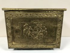 A brass embossed coal box