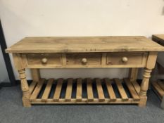 A reclaimed pine dresser fitted three drawers