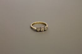 18ct three stone diamond ring approximately .35ct, 2.
