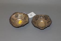 A pair of pierced silver bonbon dishes,