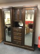 An Edwardian mahogany compactum wardrobe CONDITION REPORT: Approximately 168cm wide,