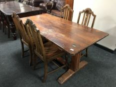 A 1930's oak refectory table and four chairs