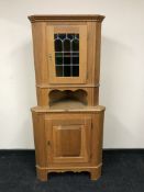 A continental oak corner cabinet
