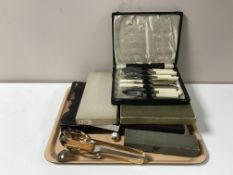 A canteen of teak handled cutlery and a tray of assorted boxed table cutlery