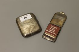 A silver cigarette case and a silver vesta containing Newcastle Brown matches