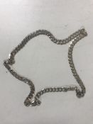 A silver 60 cm flat link necklace, 36.4g.