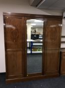 A Victorian inlaid mahogany triple door wardrobe CONDITION REPORT: Approximately