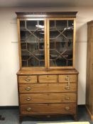 A Georgian inlaid mahogany glazed bookcase