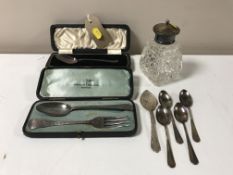 A collection of silver including cased baby spoon, cased spoon and fork,