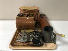 A tray of vintage leather handbag, cased binoculars, leather flask holder,