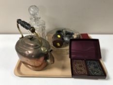 A tray containing copper teapot, cut glass decanter with stopper,