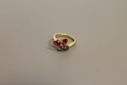An 18ct gold butterfly ring set with diamonds and semi-precious stones