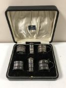 A cased of pair of silver mustard pots,