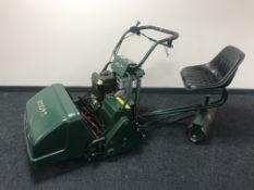 An Atco Royale 24E I-C petrol sit-on cylinder lawn mower,