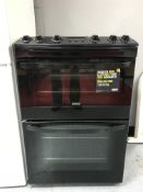 A black Zanussi gas cooker